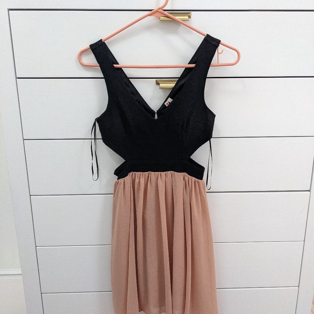 Dress with side cutouts